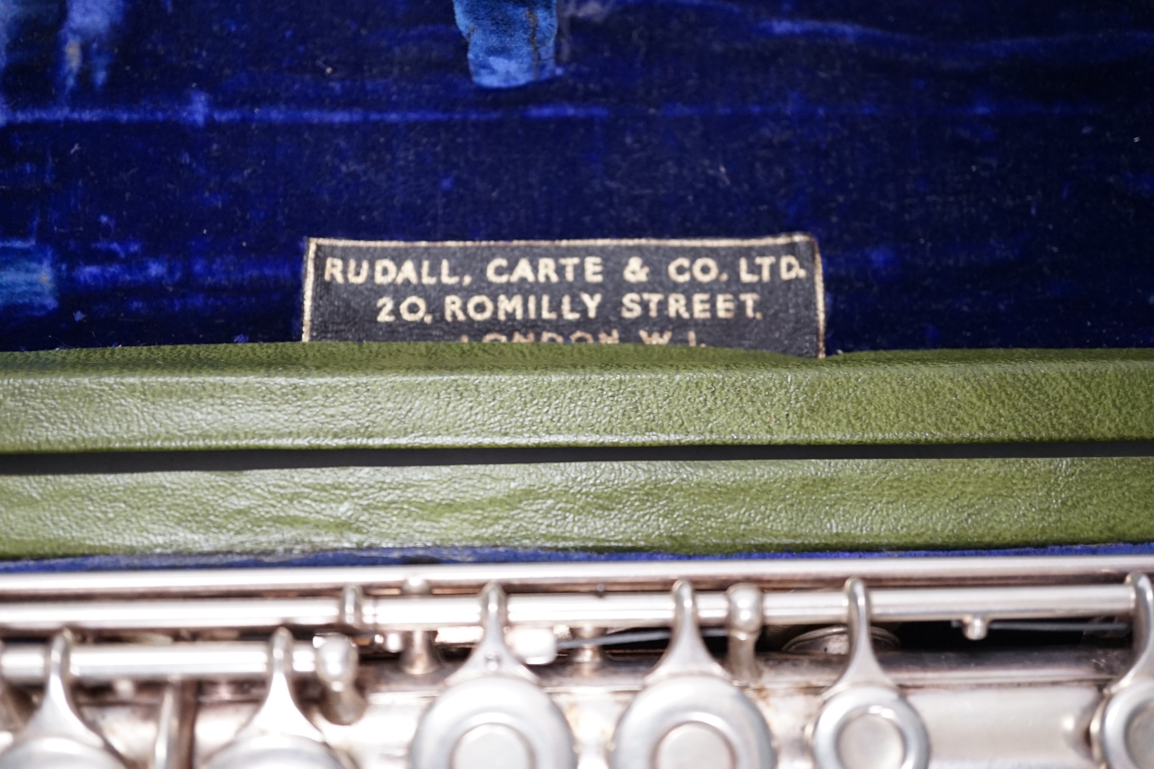 A cased Rudall, Carte & Co. flute, with closed hole key work and sterling silver head joint